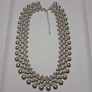 Elegant Silver Necklace Lays Flat On Neck